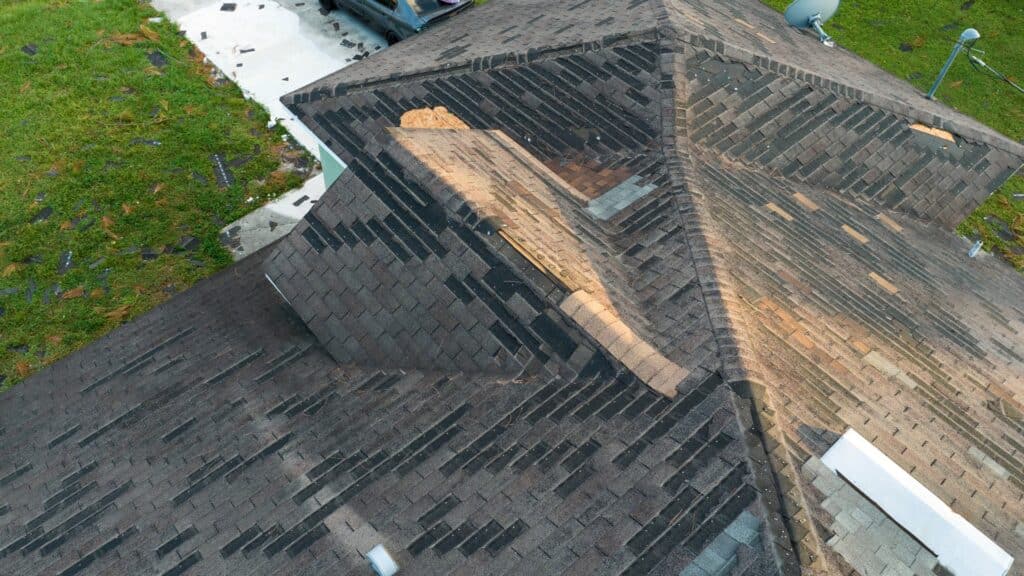 Should I Call My Insurance Company or Roofer First After Storm Damage Shingle Roof Damage After Storm Schoenherr Roofing Michigan